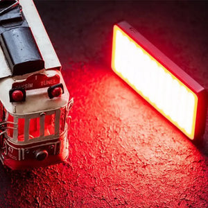 VIJIM VL196 RGB LED Video Light with red lighting and tram model. Taksim Tunnel.