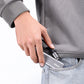 Person placing Ulanzi C060 USB-C video capture card into pocket.