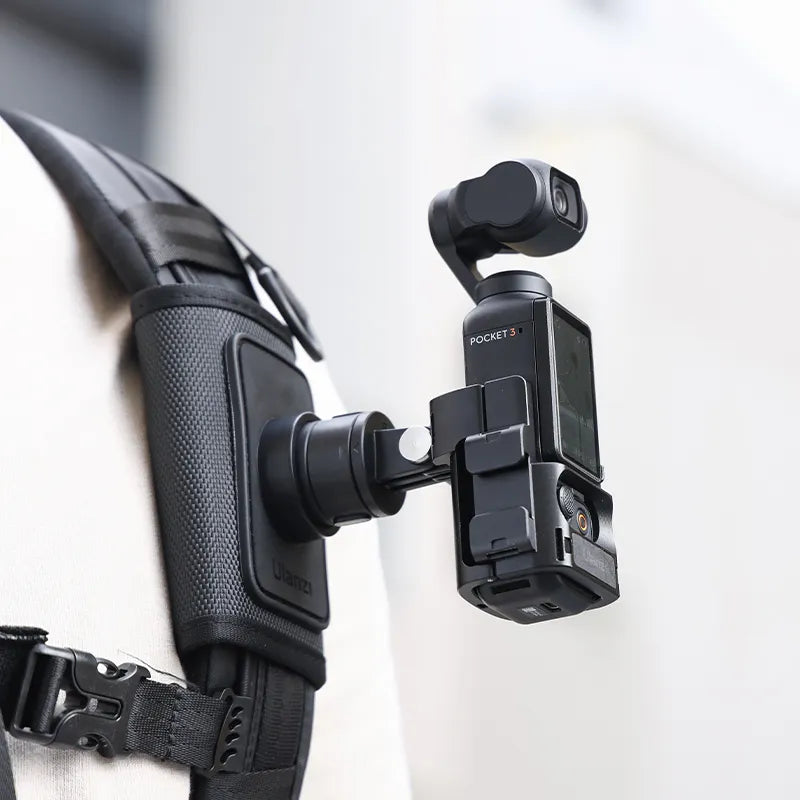 DJI Osmo Pocket 3 mounted on Ulanzi PK-06 adapter attached to backpack.