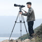 User operating Ulanzi VideoFast Heavy Duty Tripod with large camera outdoors.