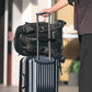 Ulanzi BP10 camera backpack mounted on a suitcase handle, ready for travel.