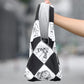 Ulanzi 17.7-inch protective wrap with black and white cartoon design held by a hand