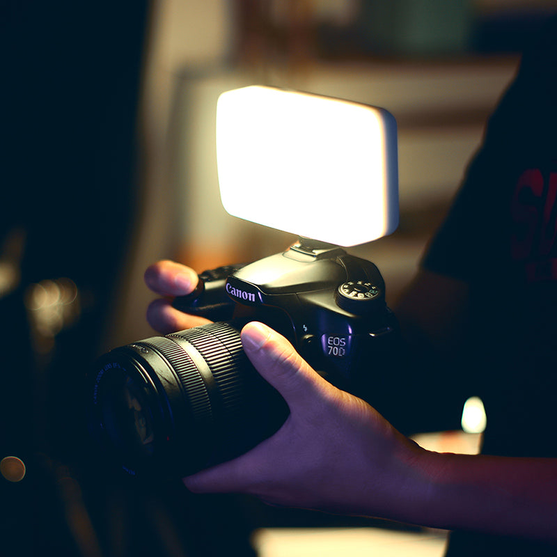 Canon DSLR camera with Ulanzi VIJIM VL120 Bi-Color LED Video Light for enhanced photography