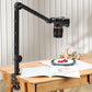 Ulanzi LS25 desk setup stand holding camera over flowers and food on a wooden table.