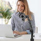 Woman using Ulanzi VIJIM LS25 desk arm for camera while working on a laptop.