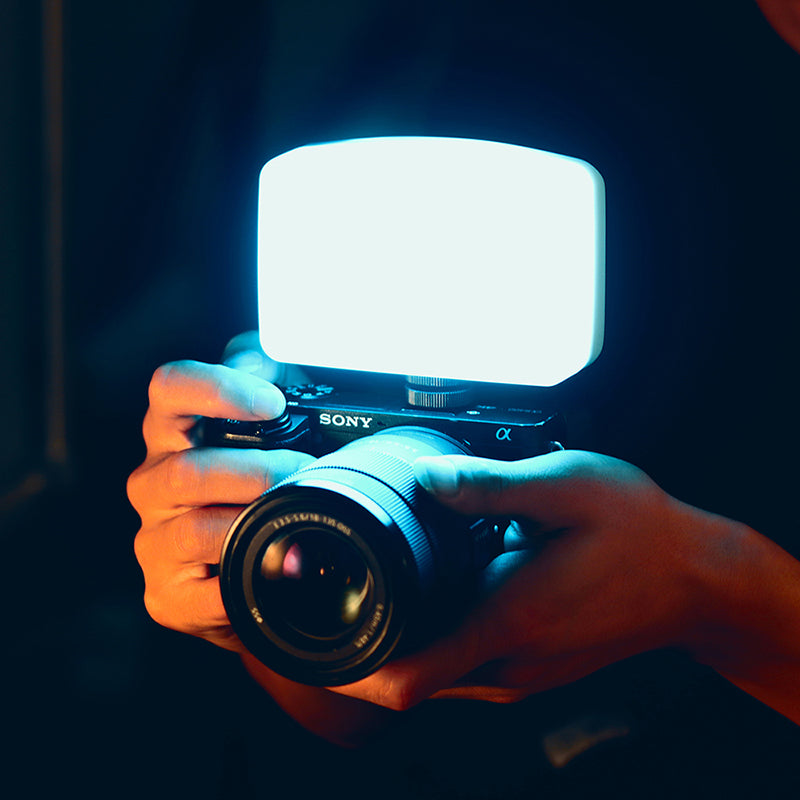 Compact Ulanzi VIJIM VL120 Bi-Color LED Video Light mounted on a Sony camera for soft illumination.
