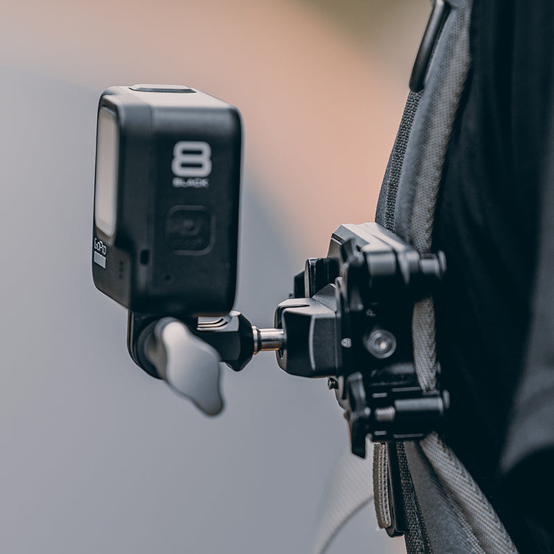 GoPro HERO8 mounted on a backpack strap using a ball head for flexible positioning
