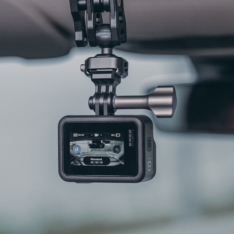 Action camera mounted with Falcam F22 Quick Release Plate using a ball head for dynamic angle shooting