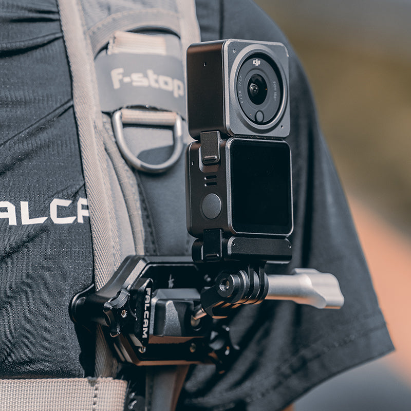 Action camera mounted on harness with Falcam F22 quick release attachment.