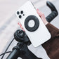 Smartphone with Ulanzi O-LOCK sticker on bicycle handlebar mount